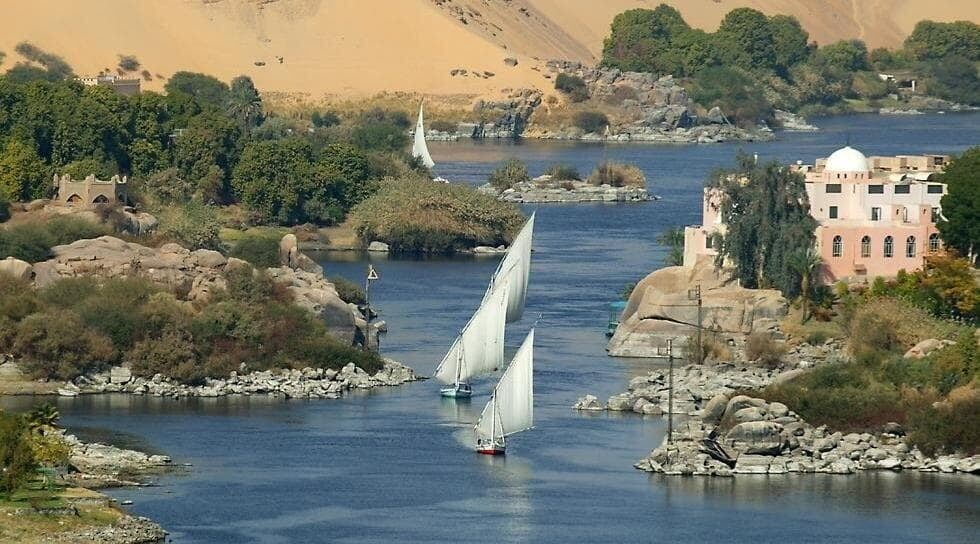 Feluccas on the Nile - a traditional Egypian wooden boat with a canvas sail