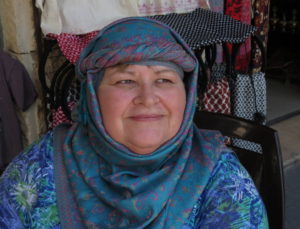 Ruth Tiessen models the traditional headgear of Jordanian culture.